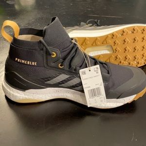 Adidas track trail running shoe.